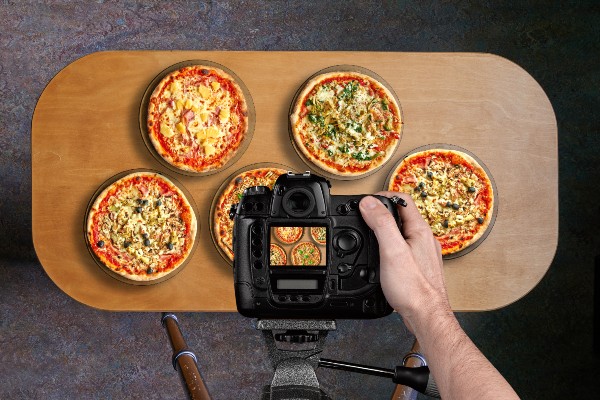 camera with tripod shooting food